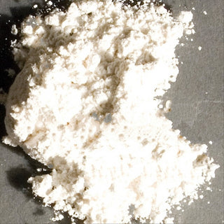 Raw synthetic bone ash in 1 lb package from Sheffield Pottery, used as ceramic raw material and glaze additive.
