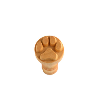 MKM Pottery Tools medium round dog paw stamp texture tool for clay and ceramics crafting, featuring a detailed paw print design.