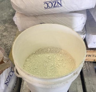 Raw New Zealand Halloysite Kaolin clay in a 10-pound bag, natural dry mineral for pottery and ceramic applications.