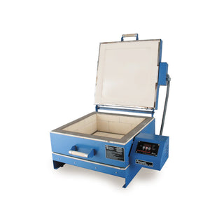 Open Paragon CS19S clamshell glass kiln for fusing, showing the interior with heating elements and ceramic shelves.