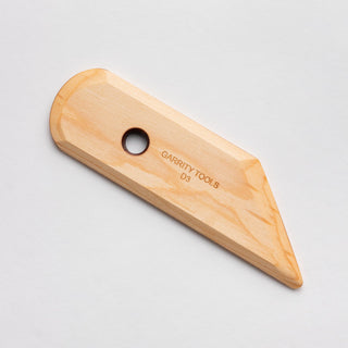 Garrity Tools Wooden Potters D3 Sculpting Tool, a versatile rib for pottery shaping and clay sculpting.