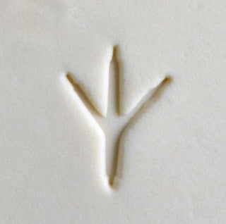 MKM Pottery Tools SCM 242 medium round stamp with chicken foot texture for pottery and clay surface decoration.