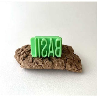 Moon Moon Ceramics Basil letter stamp from their texture tools collection, showcasing a detailed ceramic alphabet stamp.