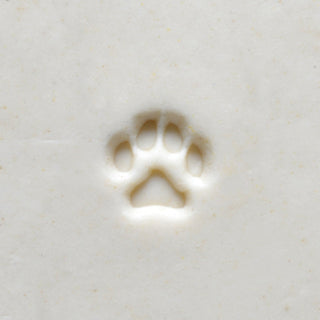 MKM SMR 043 Mini Round Dog Paw Stamp for pottery texture tools, showing detailed paw print design on a circular rubber stamp.
