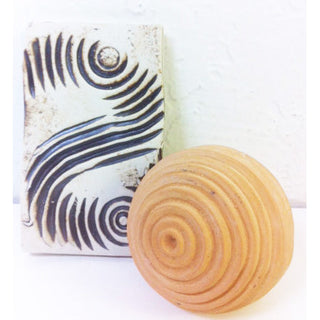 Olander Earthworks TS-5 Linear Moon Ball texture sphere with spiral pattern, showcasing detailed surface design for texture tools.