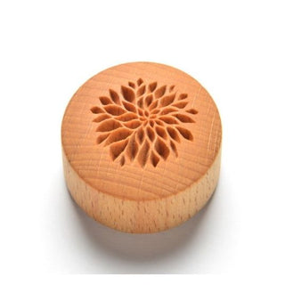White MKM CT 002 Curve Top Stamp with Dahlia texture design for pottery and clay shaping by MKM Pottery Tools.