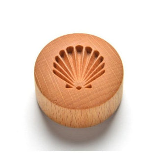 White MKM CT 009 Curve Top Stamp with scallop shell texture for pottery and clay shaping by MKM Pottery Tools.