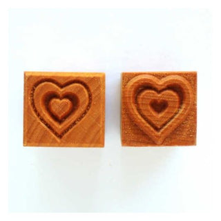White MKM SSM 141 Heart in Heart medium square stamp from MKM Pottery Tools for texture decoration in pottery and clay projects.