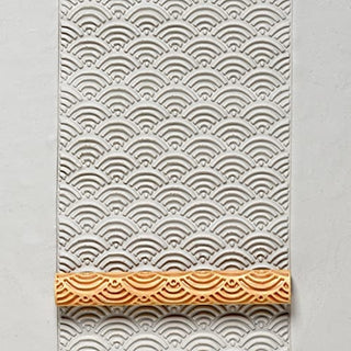 MKM TW 01 Twig Roller from Sea of Japan, a pottery texture tool with a natural twig design for clay surface decoration.