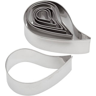 Ateco stainless steel paisley shape cutter set with seven versatile cookie or fondant cutters on a white background.