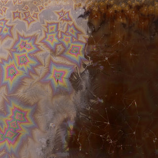 Amaco Cosmos Dark Matter ceramic glaze in pint container, showcasing a deep, rich glaze finish for pottery projects.