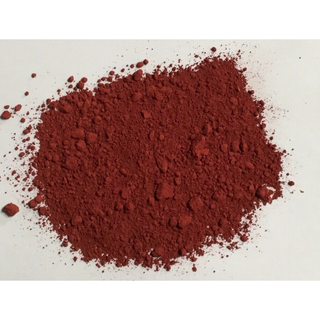 Copper Oxide Red raw material from Sheffield Pottery, showing a pile of vibrant reddish-brown copper oxide powder.