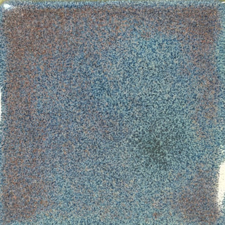 Ceramic glaze by Coyote Glazes in 5 and 10 pound units, shown on a piece of pottery with a glossy, textured surface.