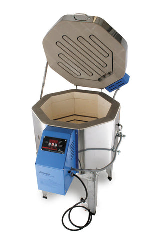 Open view of Paragon Kilns Fusion 8 kiln furniture kit with shelves and supports inside the ceramic kiln for firing.