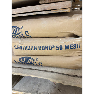 Raw Hawthorn Bond 50M fire clay bag from Sheffield Pottery, showing the 50-pound bag of raw ceramic fire clay material.