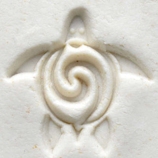 MKM SCM 017 medium round turtle stamp for pottery texture tools by MKM Pottery Tools shown on a clay surface.