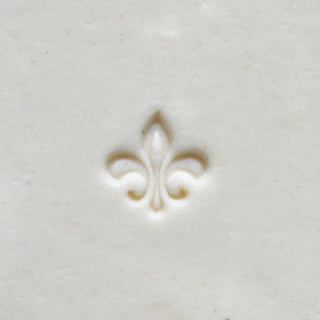 MKM SMR 031 Mini Round Stamp with Fleur-de-lis design used as texture tool for pottery and clay projects.