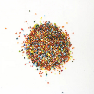 Medium ceramic glaze with specks and flecks from FLECKS & SPECKS, showcasing a textured, speckled pottery glaze finish.