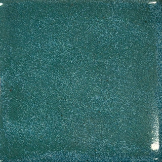 Coyote Glazes pint ceramic glaze in Veridian Forest, showcasing a rich, earthy green glaze with subtle variations on pottery surface.