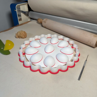 MoonMoon Ceramics deviled egg drape form for pottery, designed for 10 chicken eggs, measuring 9.9 x 1.2 inches, by Moon Moon Ceramics Stamps.